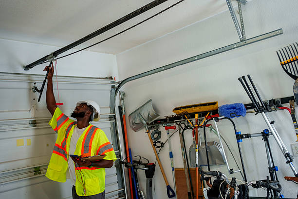 Professional Garage Door Panel Replacement technician working in Amery, WI